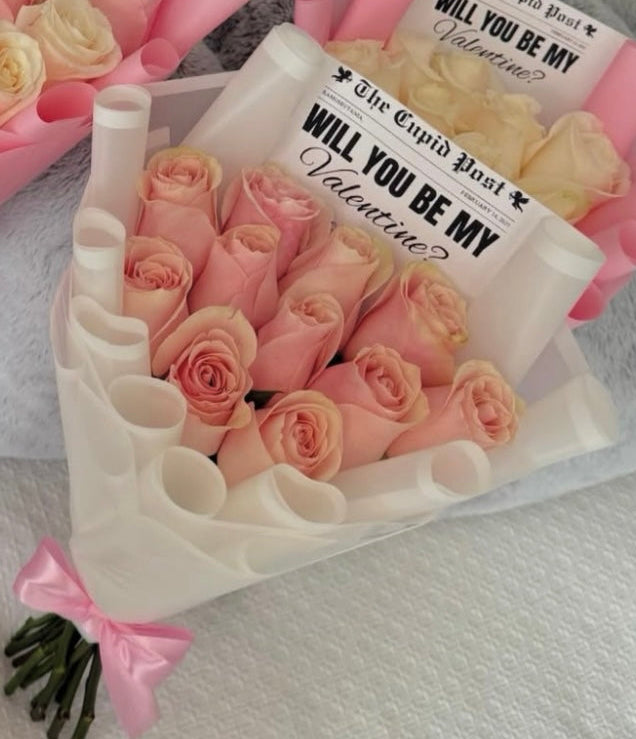 12 pink rose newspaper bouquet