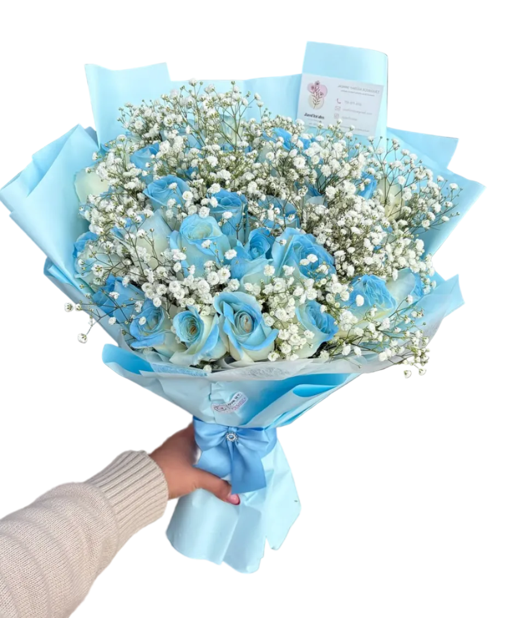 Bouquet of blue and white flowers held by a person on a computer screen with Instagram open.